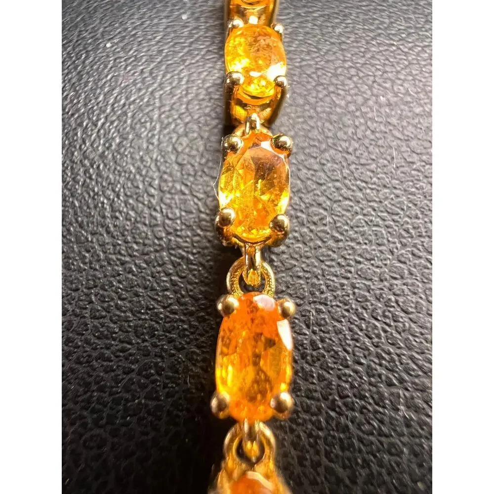 Yellow spessartine garnet tennis bracelet in gold over sterling silver